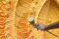 Painting Hindu goddess Kali idols