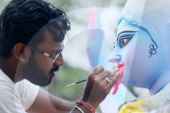 Painting Hindu goddess Kali idols