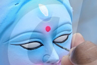 Painting Hindu goddess Kali idols