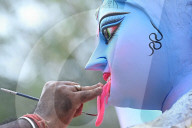 Painting Hindu goddess Kali idols