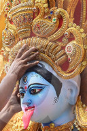 Painting Hindu goddess Kali idols