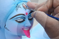 Painting Hindu goddess Kali idols