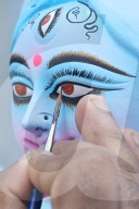 Painting Hindu goddess Kali idols