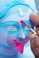 Painting Hindu goddess Kali idols