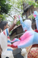 Painting Hindu goddess Kali idols