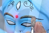 Painting Hindu goddess Kali idols