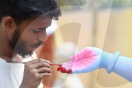 Painting Hindu goddess Kali idols
