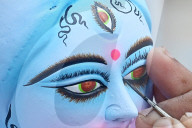 Painting Hindu goddess Kali idols
