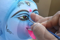 Painting Hindu goddess Kali idols