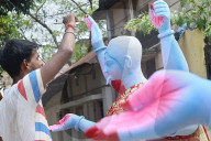 Painting Hindu goddess Kali idols