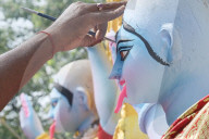 Painting Hindu goddess Kali idols