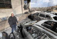 Cars burnt by Israeli settlers in West Bank
