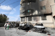 Cars burnt by Israeli settlers in West Bank