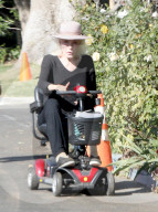 TVâ€™s original Catwoman Julie Newmar, 91, makes an extremely rare public appearance as she picks up an Uber Eats lunch delivery outside her LA home