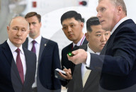 Putin hits bottom, buddies-up with crazy-man Kim Jong Un 