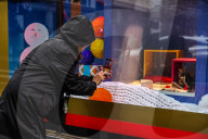 Macys of San Francisco festures adoptable kittens in their Christmas window displays
