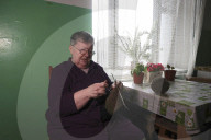 Evacuees from Kharkiv region knit for Ukrainian military