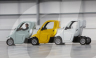 Cars for hire that wait strung together like shopping carts