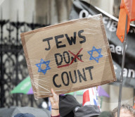 British Jews and allies from across the UK, march together against antisemitism from The Royal Courts of Justice to Parliament Square, London, UK