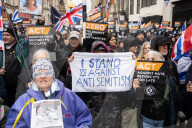 British Jews and allies from across the UK, march together against antisemitism from The Royal Courts of Justice to Parliament Square, London, UK