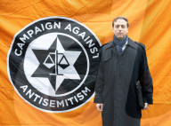 British Jews and allies from across the UK, march together against antisemitism from The Royal Courts of Justice to Parliament Square, London, UK