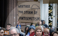 British Jews and allies from across the UK, march together against antisemitism from The Royal Courts of Justice to Parliament Square, London, UK