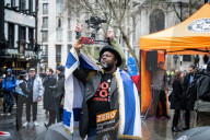 British Jews and allies from across the UK, march together against antisemitism from The Royal Courts of Justice to Parliament Square, London, UK