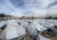 Displaced Palestinian families living in tent city