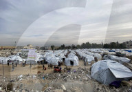Displaced Palestinian families living in tent city