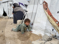 Displaced Palestinian families living in tent city
