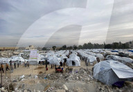 Displaced Palestinian families living in tent city