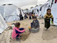Displaced Palestinian families living in tent city