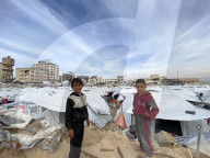 Displaced Palestinian families living in tent city