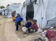 Displaced Palestinian families living in tent city
