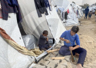 Displaced Palestinian families living in tent city