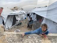 Displaced Palestinian families living in tent city