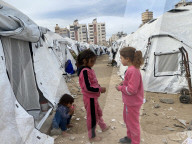 Displaced Palestinian families living in tent city