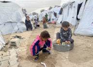 Displaced Palestinian families living in tent city