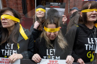Hostage Families rally at three London embassies on World Human Rights Day in plea for intervention in releasing the 100 hostages held in Gaza, London, UK.