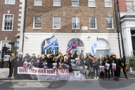 Hostage Families rally at three London embassies on World Human Rights Day in plea for intervention in releasing the 100 hostages held in Gaza, London, UK.