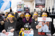 Hostage Families rally at three London embassies on World Human Rights Day in plea for intervention in releasing the 100 hostages held in Gaza, London, UK.