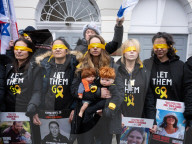 Hostage Families rally at three London embassies on World Human Rights Day in plea for intervention in releasing the 100 hostages held in Gaza, London, UK.