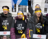Hostage Families rally at three London embassies on World Human Rights Day in plea for intervention in releasing the 100 hostages held in Gaza, London, UK.