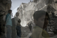 Airstrike destroys Aleppo neighborhood