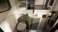 Electric powered mobile home expands at touch of a button