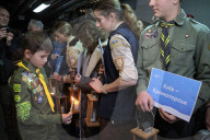 Plast scouts bring Peace Light of Bethlehem to Kyiv