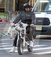 Artist JR E-Bike Riding - NYC