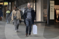 Men Begin Xmas Shopping on Christmas Eve