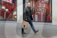 Men Begin Xmas Shopping on Christmas Eve