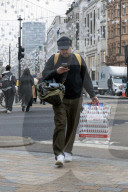 Men Begin Xmas Shopping on Christmas Eve